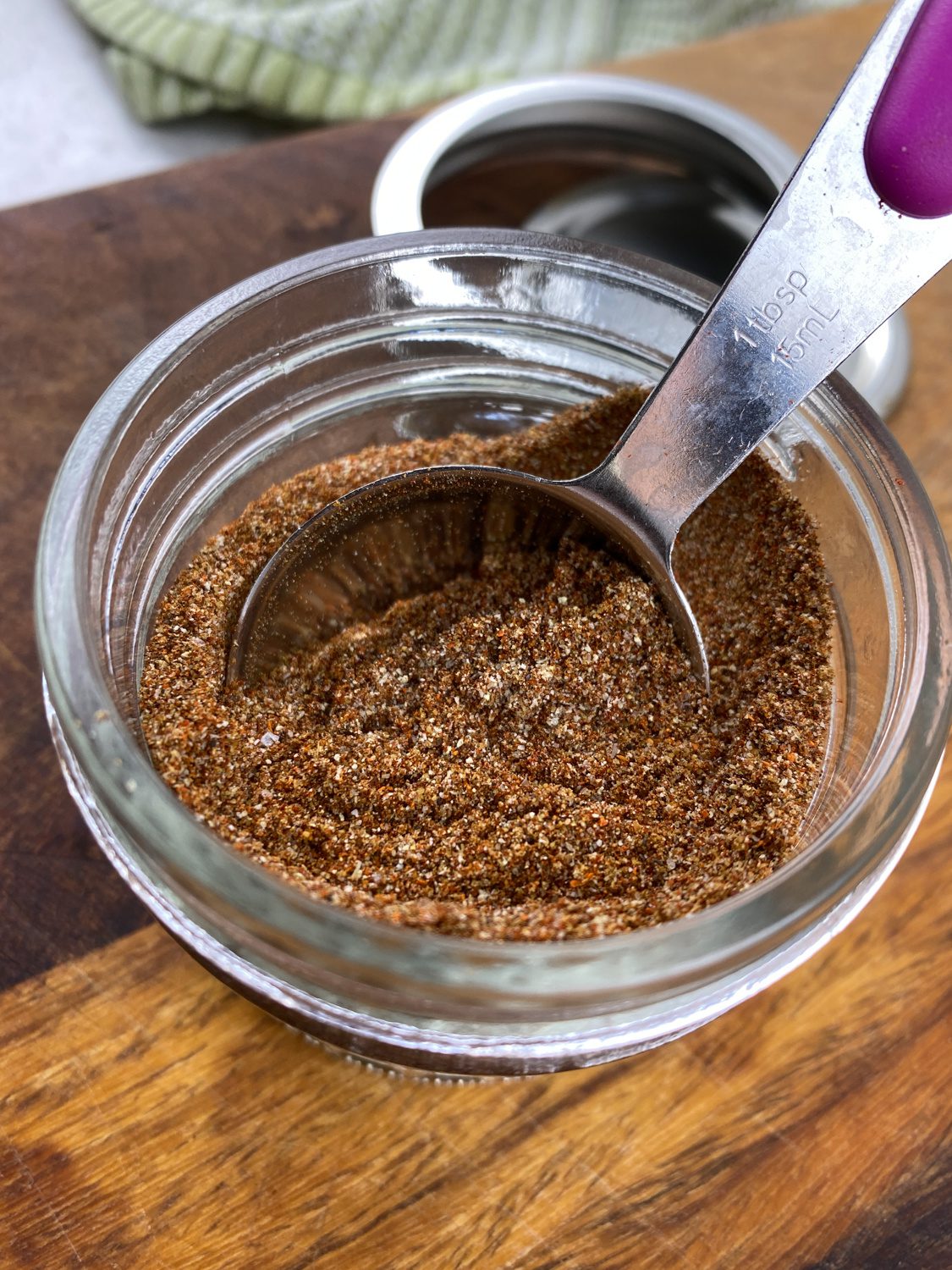 Homemade taco seasoning in a glass jar