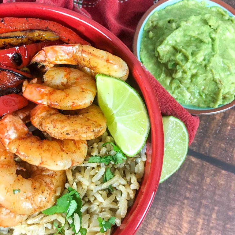 Shrimp fajita bowl with cilantro-lime rice and colorful peppers
