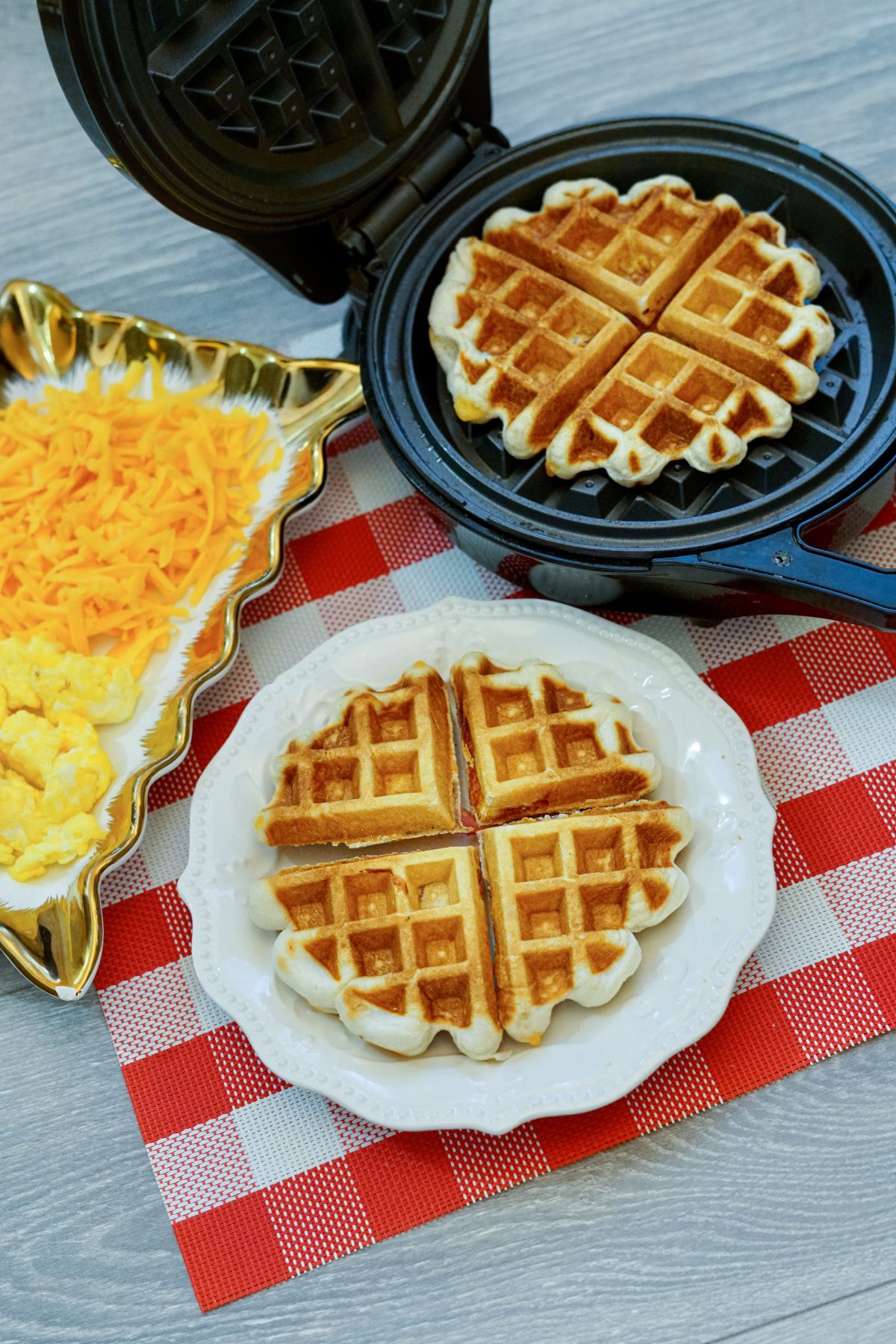 Waffle iron breakfast sandwich with melted cheese