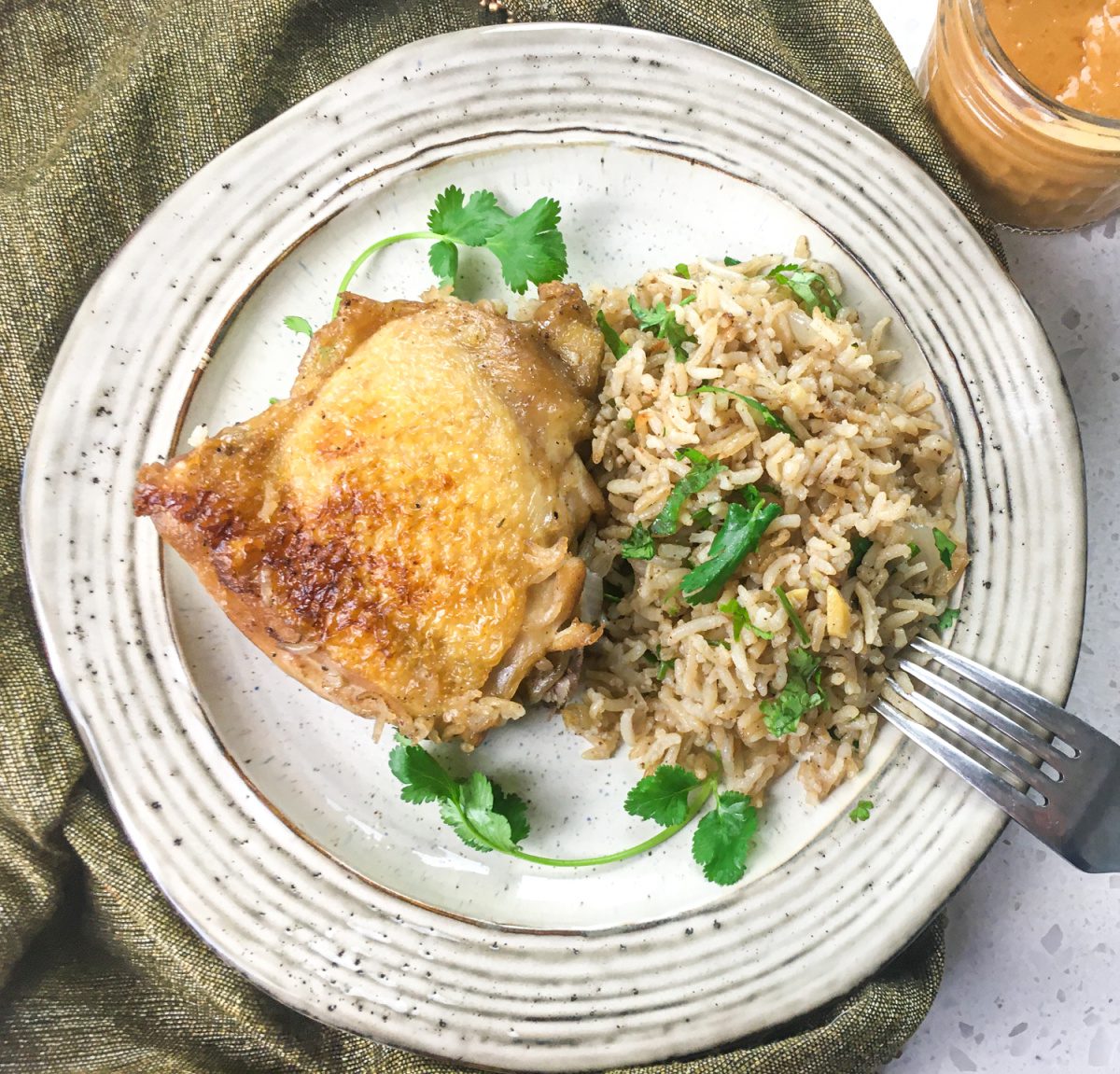 Dutch oven chicken and rice with peanut sauce on the side
