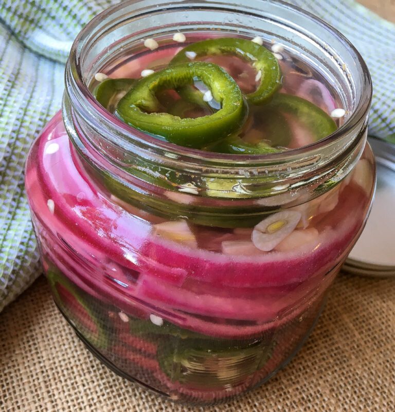 Quick Pickled Jalapeños and Red Onion in a glass jar