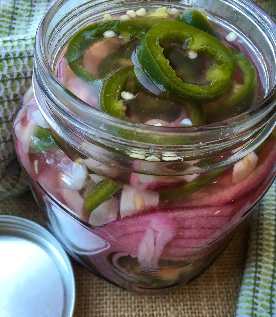 Quick Pickled Jalapeños and Red Onion in a glass jar